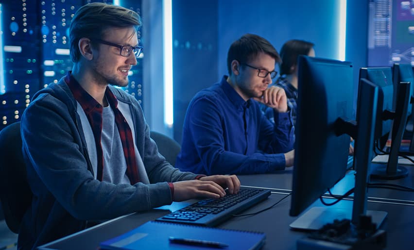 Help desk professionals working within a security operations center to remotely protect clients’ critical information technology infrastructure and network.