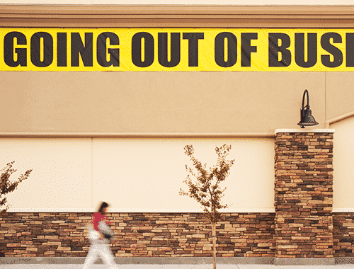Exterior of a business with a “going out of business sign” on the exterior after a data breach caused near complete data loss.