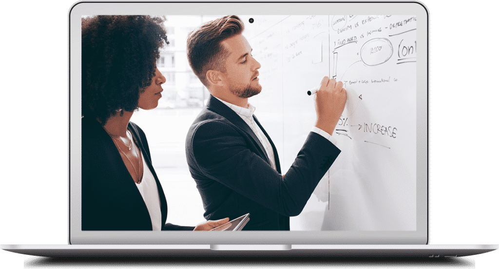 An businessman and businesswoman brainstorm and strategize on a whiteboard to identify the true cost of information technology within their organization.