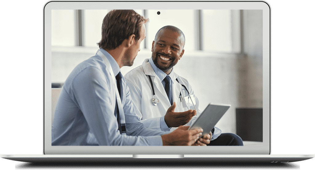 Two mature smiling doctors having discussion about patient diagnosis, holding digital tablet.