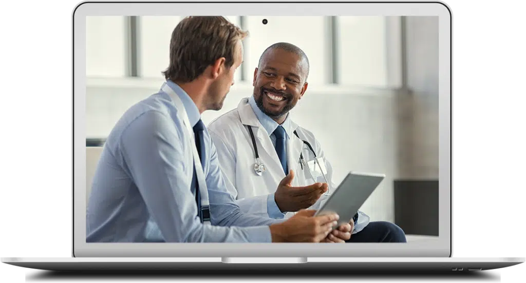 Two mature smiling doctors having discussion about patient diagnosis, holding digital tablet.