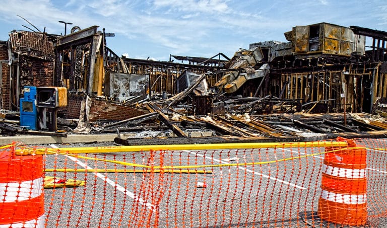 An exterior view of a restaurant (hospitality business) that burned down after a fire resulting in complete data loss for the business owner who did not have redundant backups of their customer and financial data.