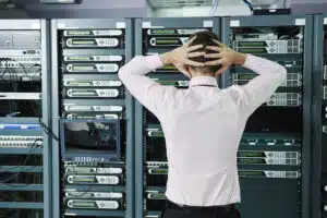 Man in server room, wishing he had a better BDR solution